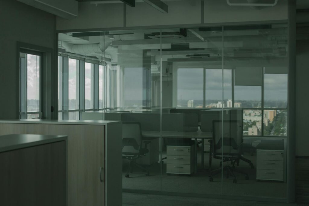 Empty office desk representing employee absenteeism linked to mental health in Canadian workplaces