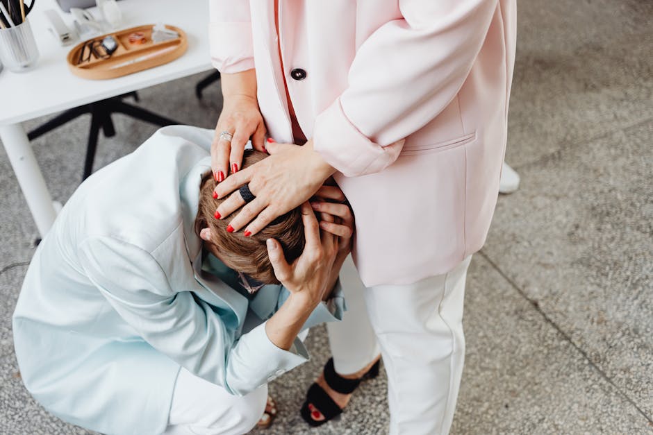 Two colleagues providing emotional support in a professional office environment
